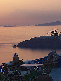 Imerovigli Sunset. Oia in the Distance