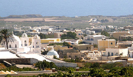 Megalochori Village. In the Distance are the Caldera Cliffs