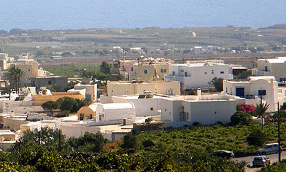 Megalochori Village. In the Distance are the Caldera Cliffs